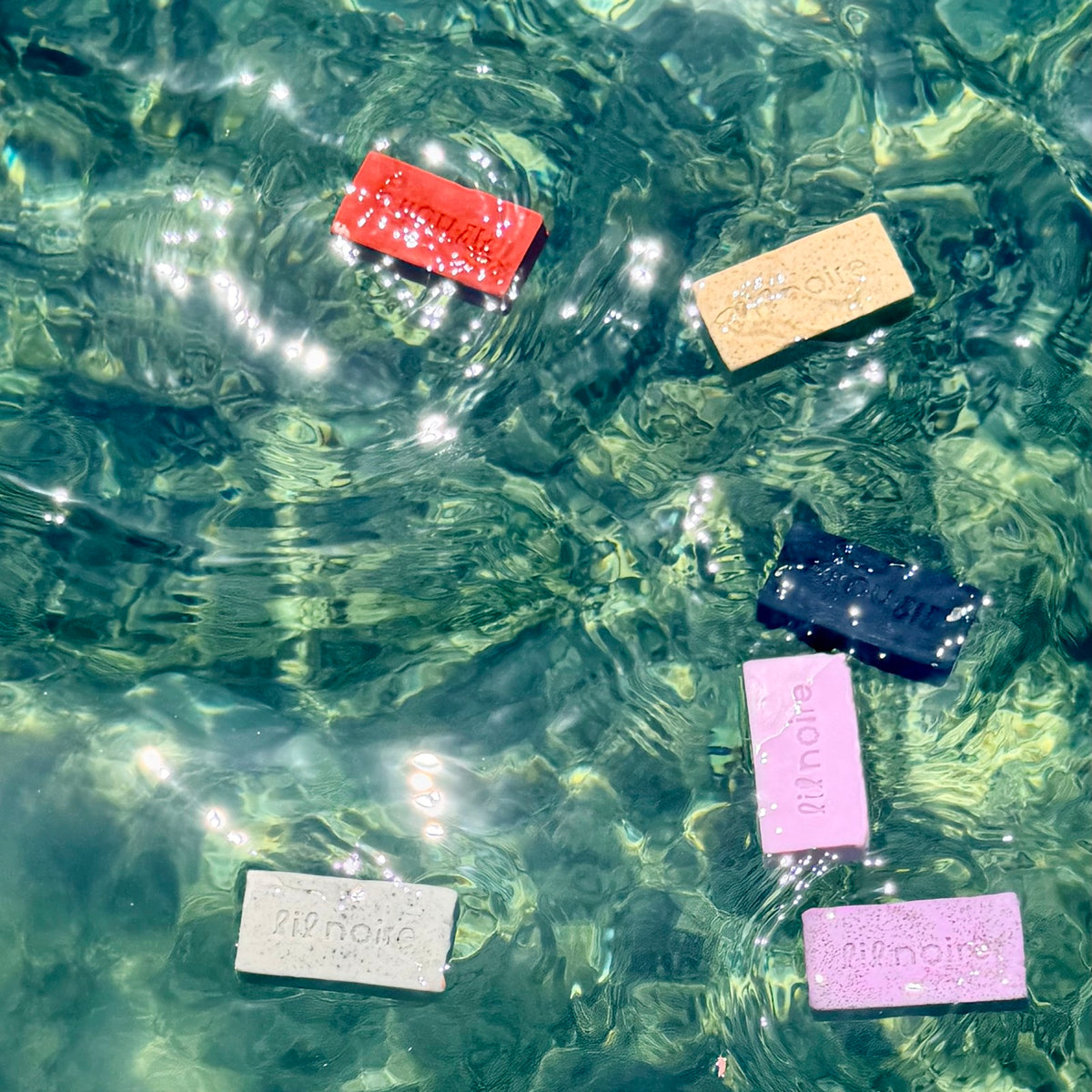 Objects for water soap collection floating in water