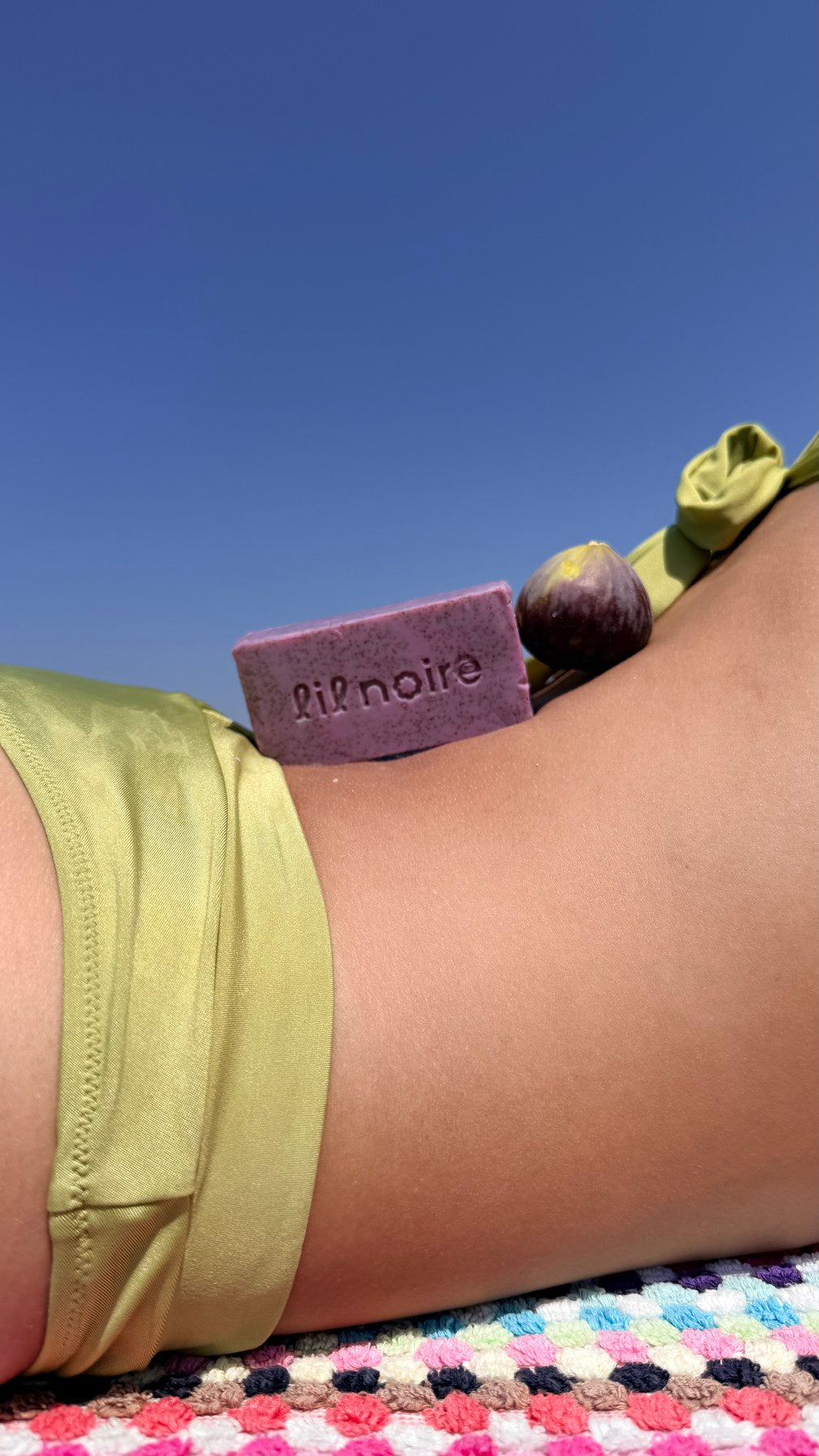 Figue Noire botanical soap with a fig in an outdoor summer setting